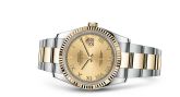 Rolex - 116233-0193  Datejust 36 Rolesor Yellow Fluted / Oyster / Champagne Roman