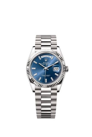 Rolex - 128239-0069  Day-Date 36 White Gold - Fluted / Bright Blue - Baguette / President