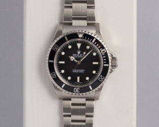 Rolex - 14060M-0001  Submariner No-Date / Stainless Steel / Black