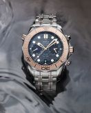 Omega - 210.60.44.51.03.001  Seamaster Diver 300M Master Co-Axial 44 Chronograph Titanium / Tantalum / Sedna Gold / Blue / Bracelet