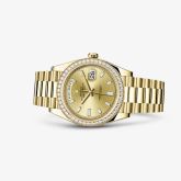 Rolex - 228348RBR-0002  Day-Date 40 Yellow Gold / Diamond / Champagne - Baguette