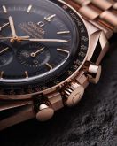 Omega - 310.60.42.50.01.001  Speedmaster Professional Moonwatch 3861 Sedna Gold / Black / Bracelet