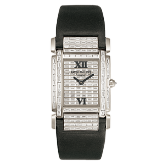 Patek Philippe - 4911G-001  Twenty~4 4911 White Gold Baguette