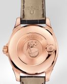 Omega - 513.58.39.21.64.001  De Ville Tourbillon Co-Axial Red Gold / Baguette / Omega Boutique