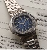 Patek Philippe - 5713/1G-001  Nautilus 5713