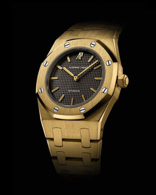 Audemars Piguet - 8638.BA.O.0424.BA.01  Royal Oak Automatic 29 Hour - MInute Yellow Gold / Black